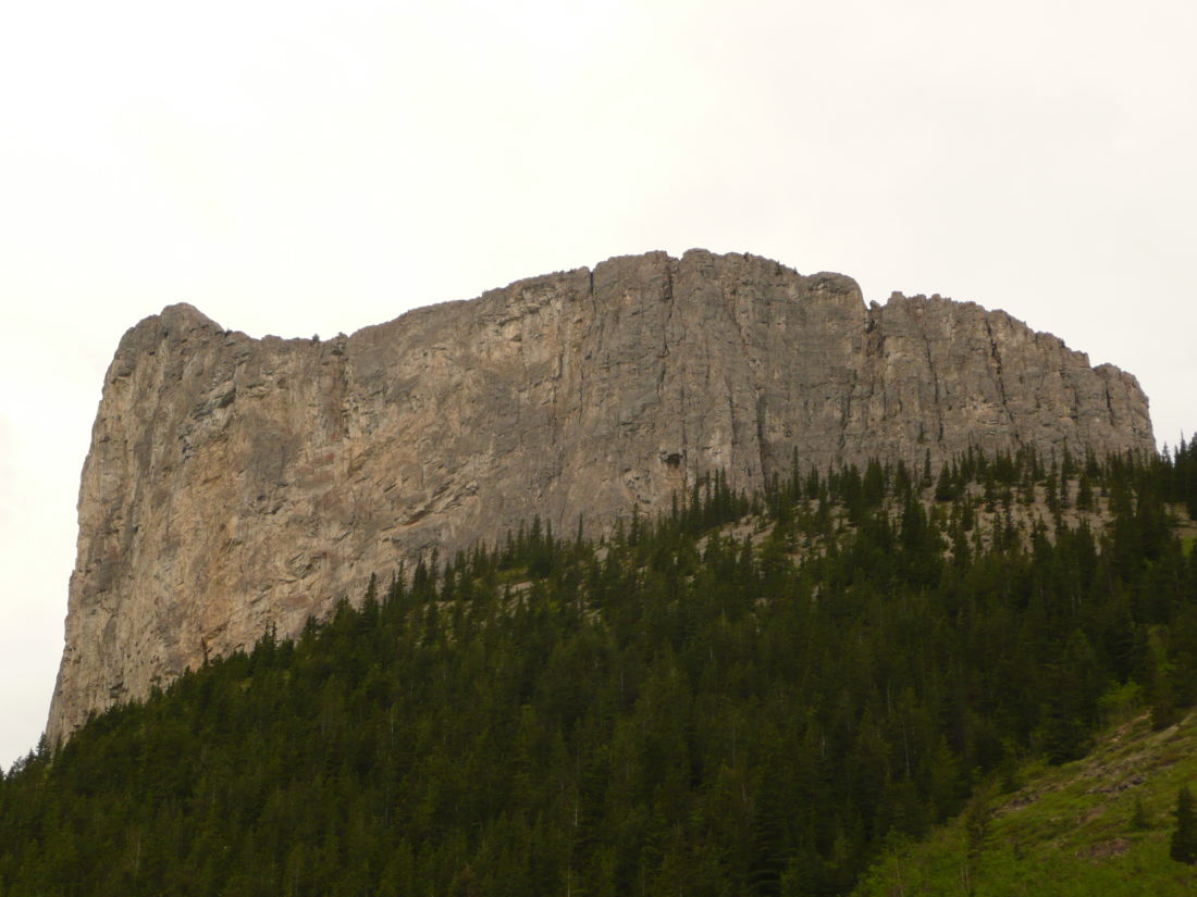 Mount Lawrie, or Yamnuska or "Yam" (slang) comes from a Stoney-Nakota First Nations word that means the "Flat-faced Mountain".